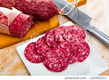 Popular Spanish Salchichon cured sausage Popular Spanish Salchichon cured sausage 126492013