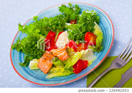 Grilled trout with vegetables 126492053