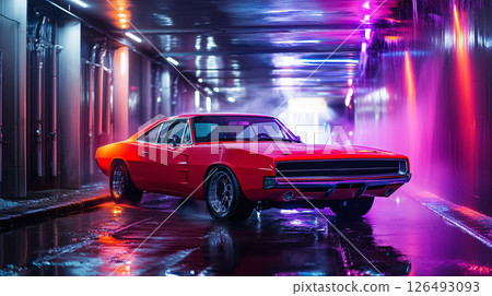 Red muscle car gleams under colorful lights in dark tunnel car wash 126493093