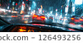 Nighttime city view through rainy car window with blurred lights and reflections in wet conditions 126493256