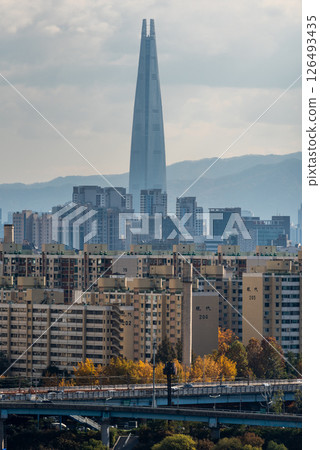Lotte World Tower skyscraper and urban sprawl cityscape of Seoul, capital of South Korea Lotte World Tower skyscraper and urban sprawl cityscape of Seoul, capital of South Korea 126493435