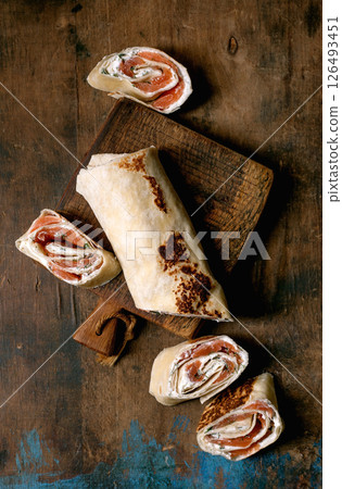Salmon Cream Cheese Wrap On Wood 126493451