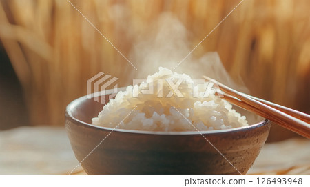 熱騰騰的米飯和稻穗背景 熱騰騰的米飯和稻穗背景 126493948