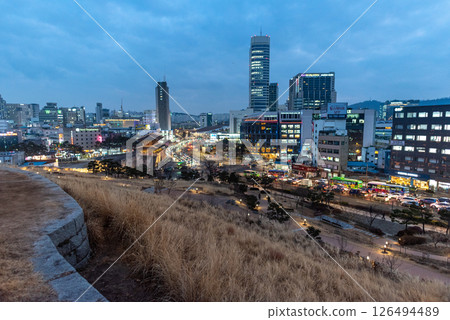 Old Seoul City Wall and Dongdaemun Heunginjimun Gate surrounded by modern buildings in downtown Seoul, South Korea Old Seoul City Wall and Dongdaemun Heunginjimun Gate surrounded by modern buildings in downtown Seoul, South Korea 126494489
