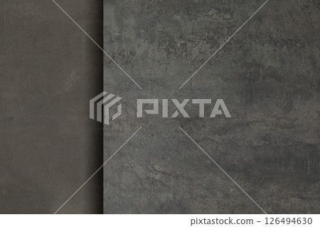 Art shabby composite background of dark-grey plastered wall with two materials, copy space. 126494630