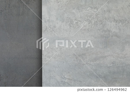 Art shabby composite background of dark-grey and light grey plastered wall, copy space. 126494962