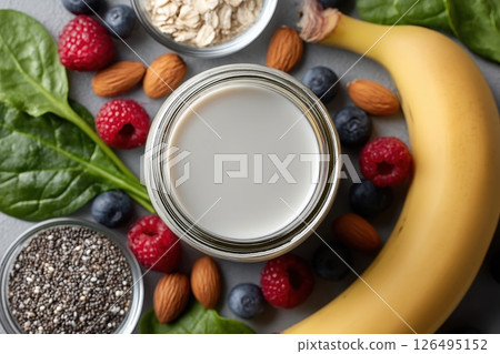 Fresh Smoothie Ingredients in Minimalist Layout with Banana, Berries, Oats, and Spinach 126495152