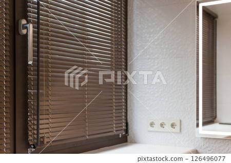 Wooden 25mm Bathroom Blinds with Modern Mirror and Textured Wall 126496077