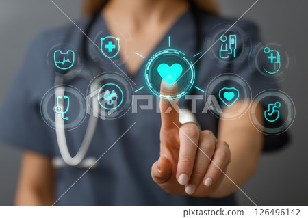 Healthcare Professional Interacting with Digital Technology for Patient Engagement and Monitoring 126496142