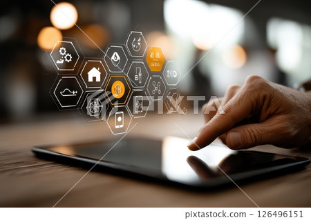 Digital Fintech Icons Collage with Hand Interacting on Tablet in Modern Workspace Environment Digital Fintech Icons Collage with Hand Interacting on Tablet in Modern Workspace Environment 126496151