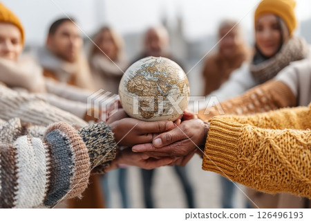 Hands of Diverse People Holding Globe Together Symbolizing Unity and Global Connection Hands of Diverse People Holding Globe Together Symbolizing Unity and Global Connection 126496193