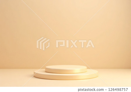 A white baby's onesie is on a bed with a teddy bear and a leaf 126498757