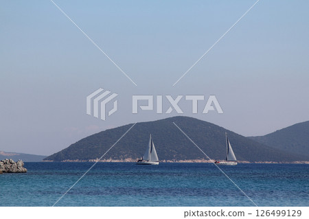 a beautiful sailboat in the sea a beautiful sailboat in the sea 126499129