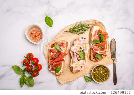 Assorted delicious baguette sandwiches Assorted delicious baguette sandwiches 126499192