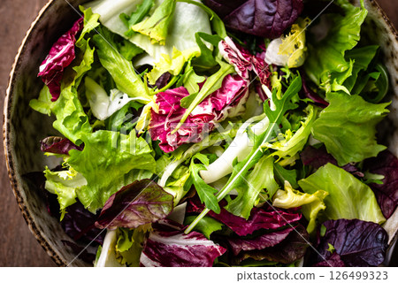 Bowl of fresh green salad mix Bowl of fresh green salad mix 126499323