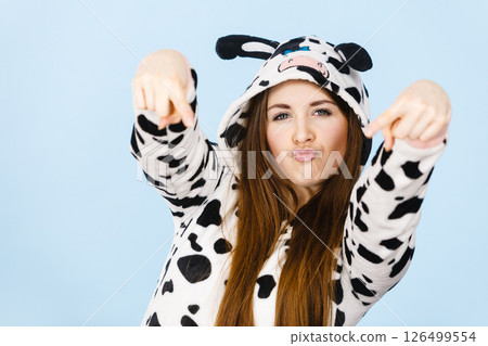 Woman wearing pajamas cartoon pointing down Woman wearing pajamas cartoon pointing down 126499554