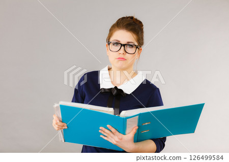 Sad business woman is tired having too much work. 126499584