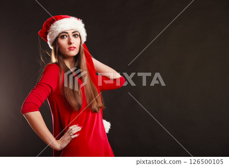 woman wearing santa claus hat on black woman wearing santa claus hat on black 126500105