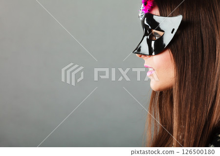 woman face with carnival mask 126500180