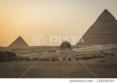 View of Great Giza Pyramids and great Sphinx in the desert Sahara View of Great Giza Pyramids and great Sphinx in the desert Sahara 126500264