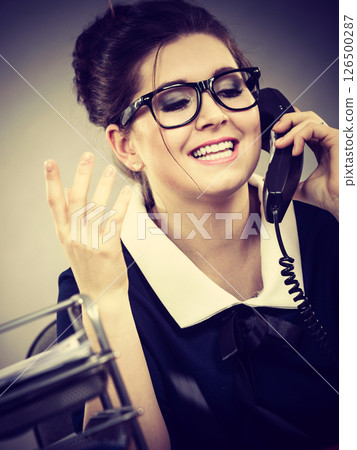 Happy secretary business woman in office Happy secretary business woman in office 126500287