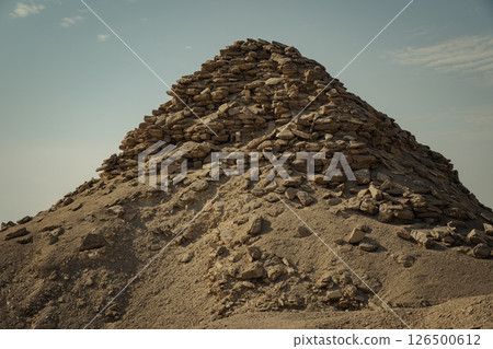 The pyramid of Djoser. Step Pyramid of Djoser and The pyramid complex of Userkaf in the Sahara desert in the Egypt	 126500612