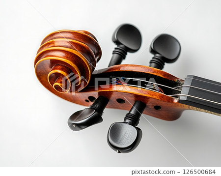 Violin Scroll Close-Up with Strings and Elegant Details 126500684