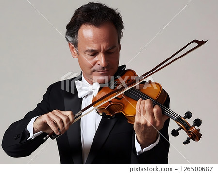 Violinist Performing in Classic Black Tie Ensemble 126500687