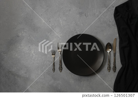 Empty black slate plate on dark stone table. Food background for menu, recipe 126501307