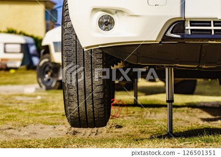 Camper leveling support leg in use. 126501351