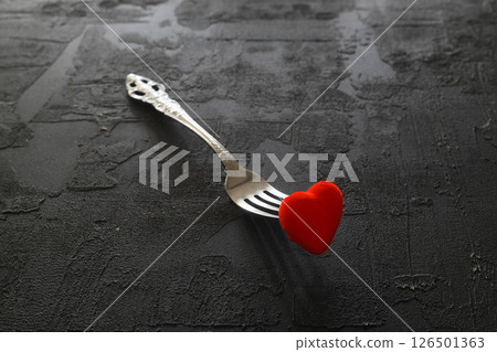 Concept image for I Love Food, Wedding Breakfast or Valentine s Day dining, isolated on black. Concept image for I Love Food, Wedding Breakfast or Valentine s Day dining, isolated on black. 126501363