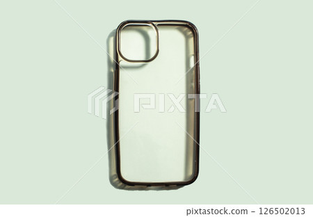 Transparent smartphone case mock up on a soft green background, showcasing sleek design and modern aesthetics, ideal for showcasing product features and branding 126502013