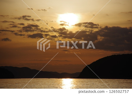 Sunset over the sea 126502757