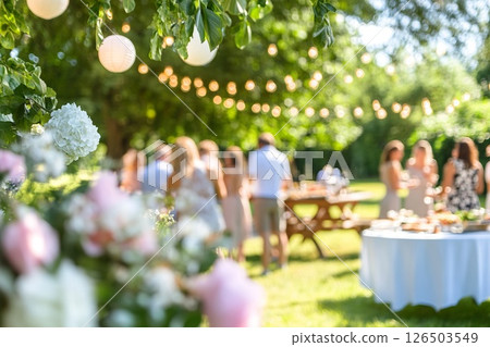 Backyard BBQs with friends and families grilling eating and socializing at lively backyard barbecue. 126503549