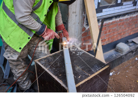Welding Sparks Are Flying High as Metalwork Beautifully Takes Shape in the Workshop 126504092