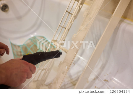 Regular steam cleaning and maintenance are essential for keeping your air conditioner optimal 126504154