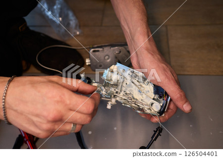 Maintenance of Electronic Devices Utilizing Specialized Cleaning Spray for Optimal Performance 126504401