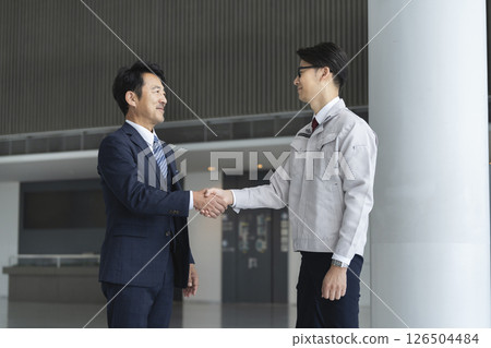 Business image: Businessmen shaking hands Business image: Businessmen shaking hands 126504484