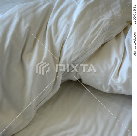 Bed and white sheet 126505682