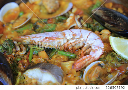 Traditional Paella Dish with Seafood and Fresh Ingredients Traditional Paella Dish with Seafood and Fresh Ingredients 126507192