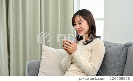 A sofa scene with a warm smile 126508938