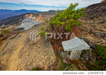A view of Mt. Adatara, the Funamyojin Shrine, the crater walls of Numanodaira, and the Azuma mountain range 126509716