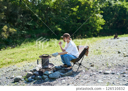 Men enjoying solo camp Men enjoying solo camp 126510832