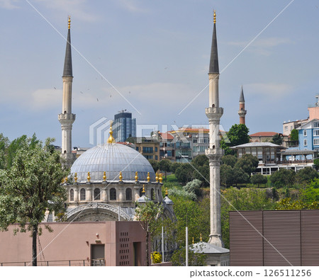 Historic Nusretiye mosque, a significant landmark in Istanbul. Nusretiye mosque's Ottoman architectural ornate beauty. Galataport shopping center. Tophane district, Istanbul, Turkey Historic Nusretiye mosque, a significant landmark in Istanbul. Nusretiye mosque's Ottoman architectural ornate beauty. Galataport shopping center. Tophane district, Istanbul, Turkey 126511256