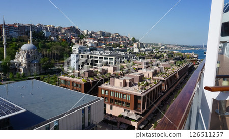 Istanbul, Turkey - Galataport waterfront in Karakoy with a view of the city skyline from abstract cruise ship 126511257