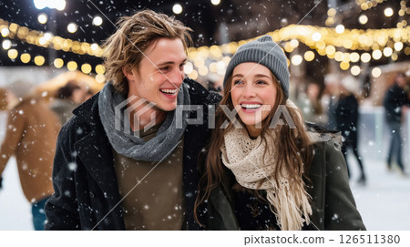 Happy Couple Smiling at Outdoor Ice Rink with Christmas Lights 126511380
