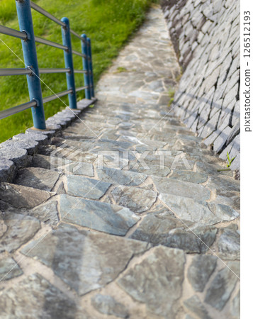 Embankment stairs leading down to the riverbed Embankment stairs leading down to the riverbed 126512193