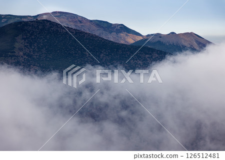 Azuma mountain range, Mount Issaikyo and Mount Azuma Kofuji above the clouds as seen from Mount Adatara and Mount Minowa Azuma mountain range, Mount Issaikyo and Mount Azuma Kofuji above the clouds as seen from Mount Adatara and Mount Minowa 126512481