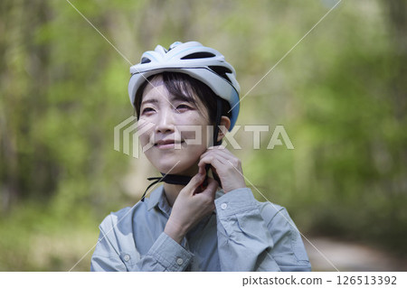 Japanese women enjoying cycling in nature 126513392