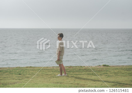 A man in his 30s working remotely at a resort A man in his 30s working remotely at a resort 126515481